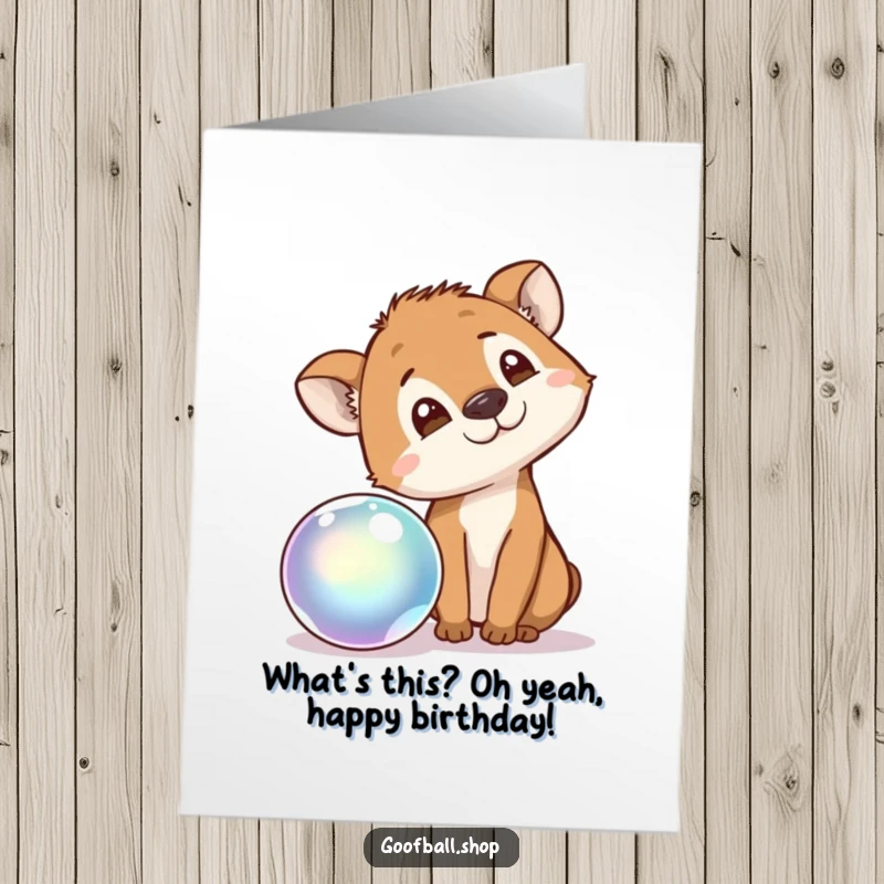 Funny Free Printable Birthday Card: A wide-eyed animal tilting its head in fascination at a brightly bouncing, iridescent ball.