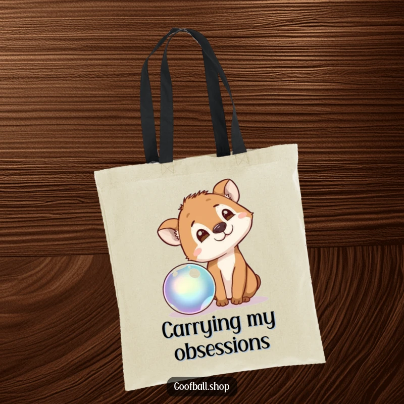 Funny Tote Bag with an animal tilting its head, intently observing a bouncy, iridescent ball, embodying playful curiosity.